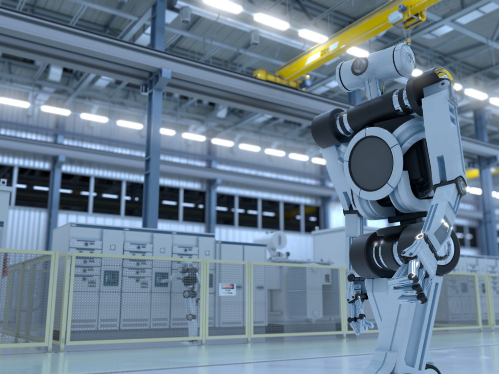 humanoidalny robot chodzący po fabryce