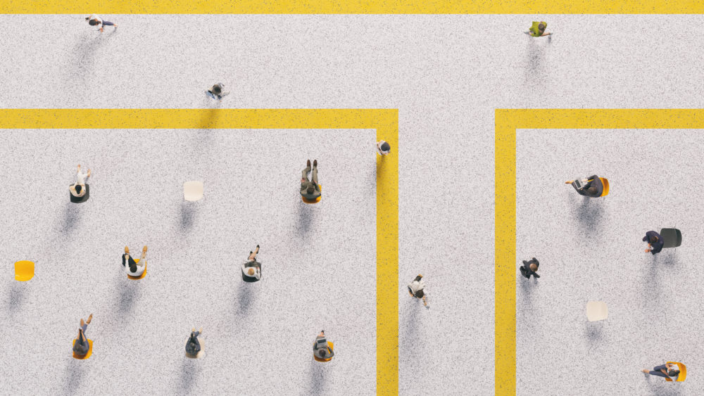 High angle view of people in a public area, following social distancing rules. All elements in the scene are 3D